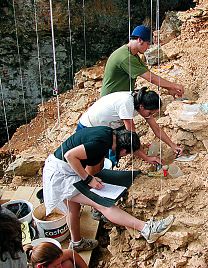 Excavating stone tools and animal bones from a Neanderthal living site
