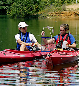 instructor and senior in a canoe