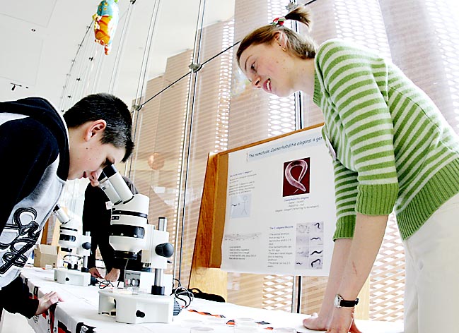 Photo of: Expo visitors looked at microscopic worms