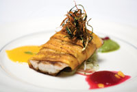 photo of grilled barramundi wrapped in plantains