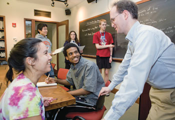 Program director Joshua Katz (right), a professor of classics, talks with linguistics students